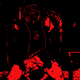 A decapitated man sits on a toilet, his head sitting in his lap.